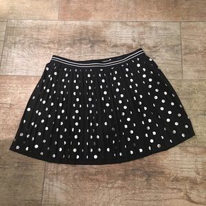Black pleated skirt with silver polka dots